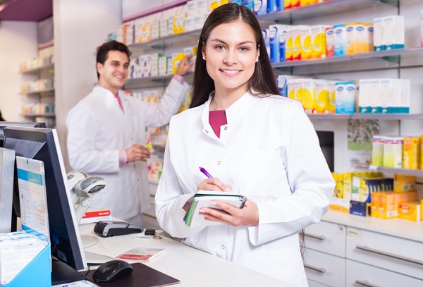 People working in a pharmacy